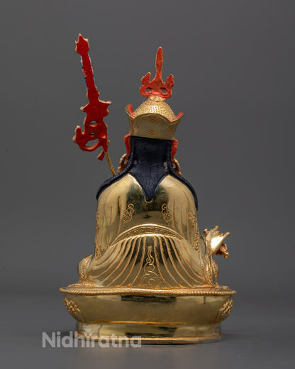 Back view of Guru Padmasambhava Sculpture displaying detailed robe and ornament carvings