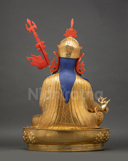 Back view of Guru Rinpoche Statue showing detailed 3D carvings and gold-accented robes