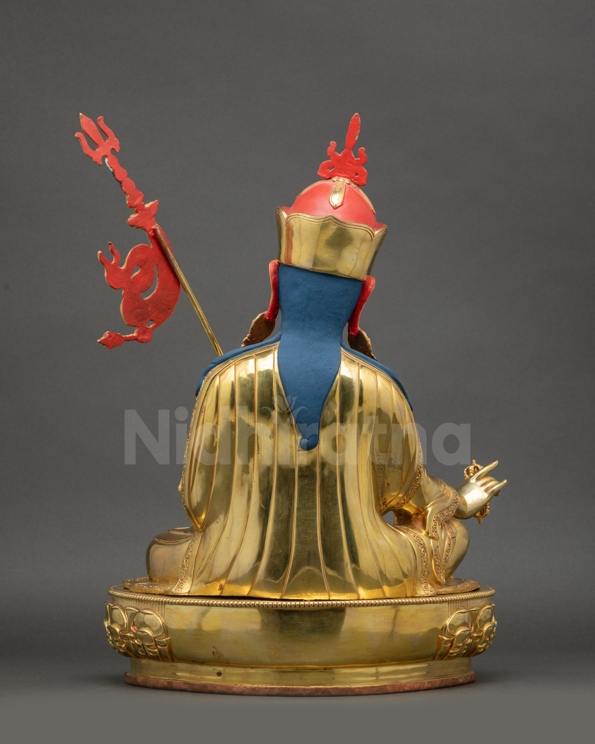 Back view of Guru Rinpoche Statue showing engraved robe patterns and lotus base detailing