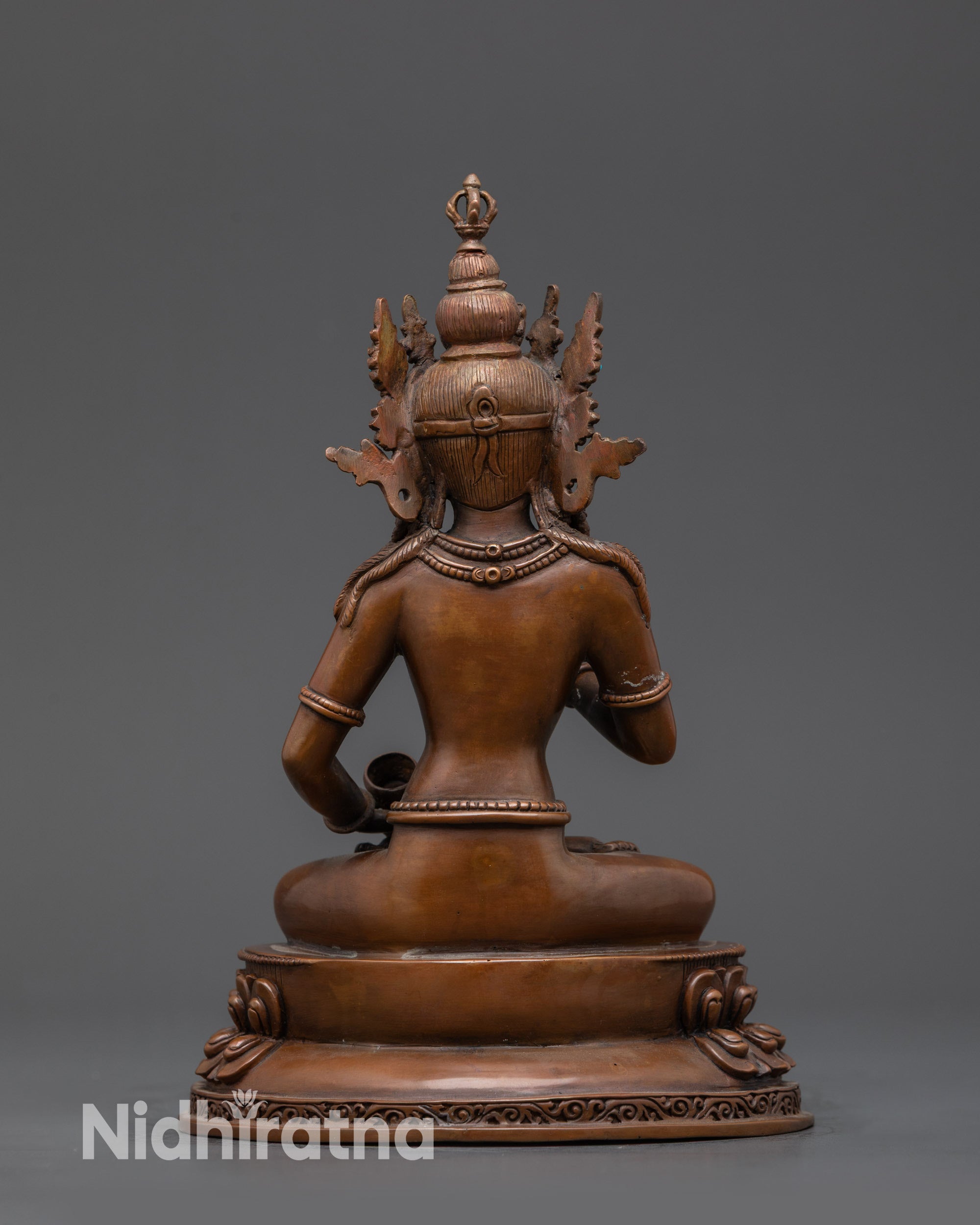 Back view of Handcrafted Dorje Sempa Statue highlighting double-layered lotus seat and earthy hue