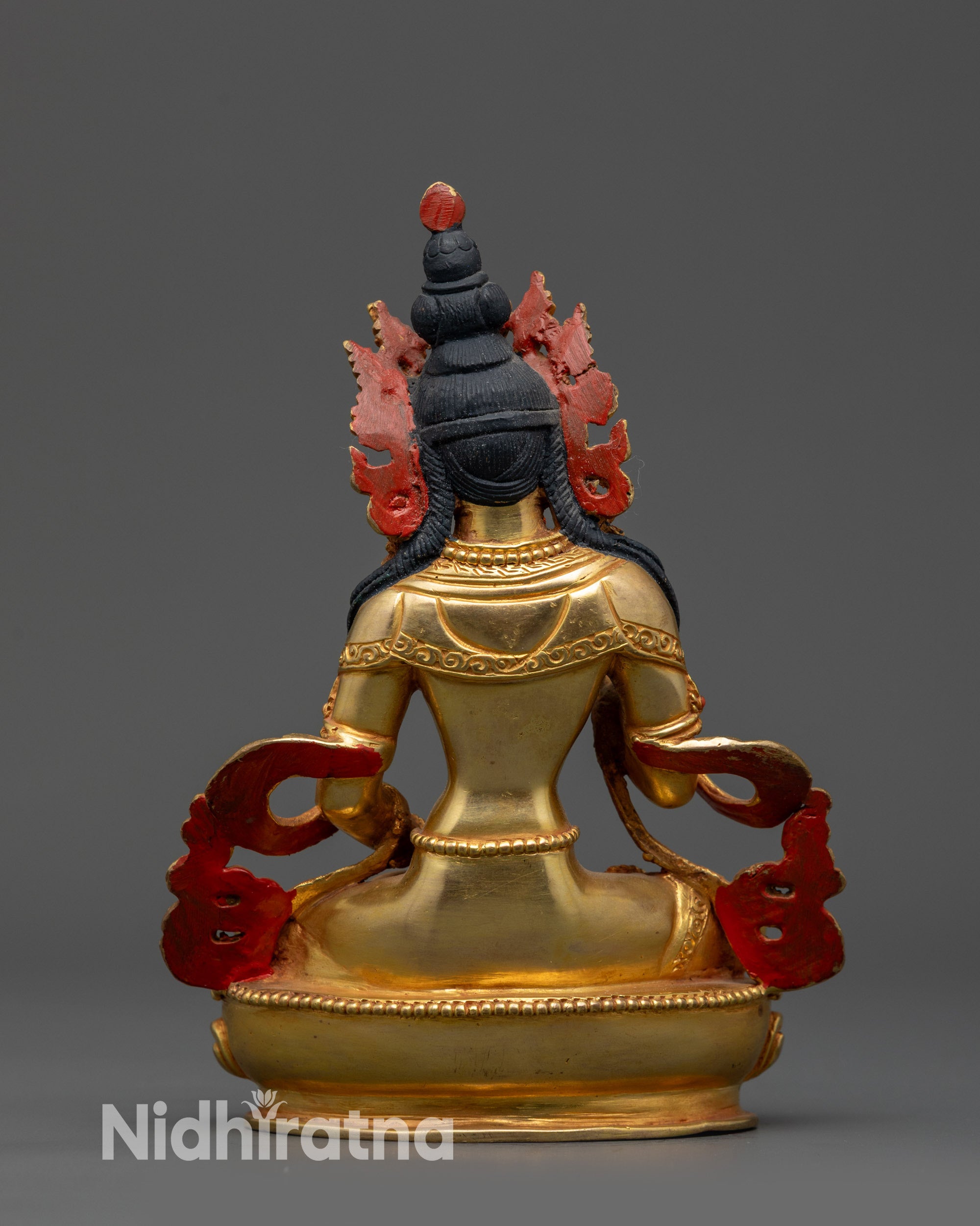 Back view of Handmade Dorje Sempa Sculpture with detailed lotus motifs and crown