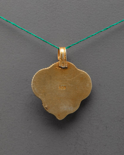 Back view of Handmade Manjushri Locket showcasing fine craftsmanship and traditional Himalayan gold-gilded metalwork.
