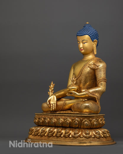 Back view of Healing Buddha statue with detailed gold fire-gilded robe craftsmanship
