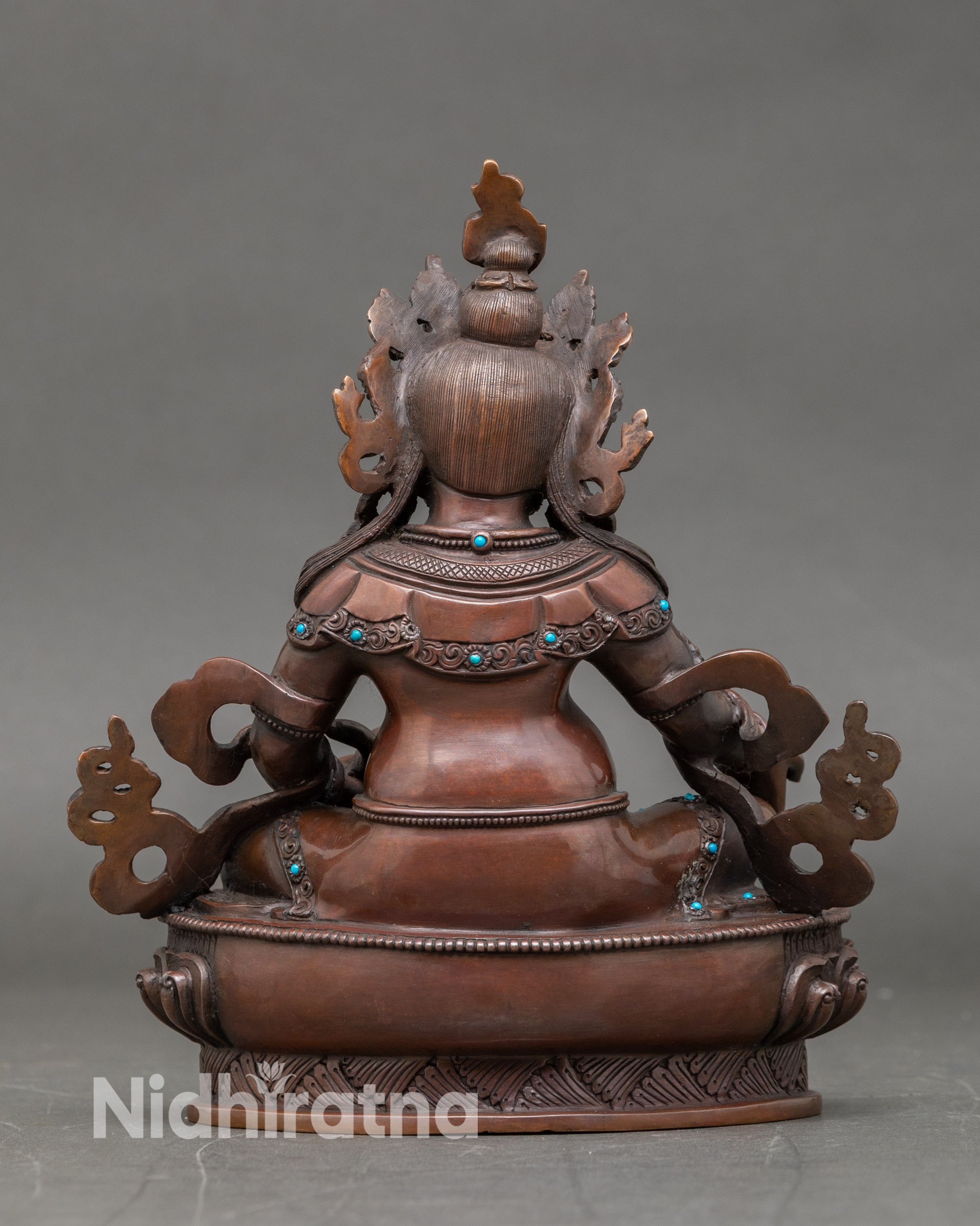 Back view of Himalayan Dzambhala statue for wealth blessings and meditation altar