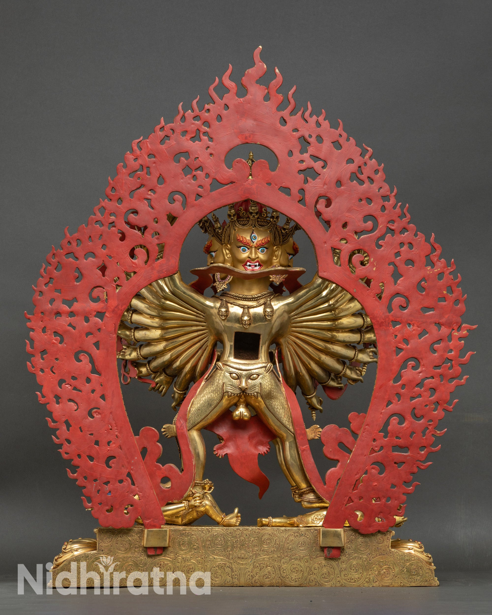 Back view of Kalachakra Statue, showing lotus throne and ornate halo design