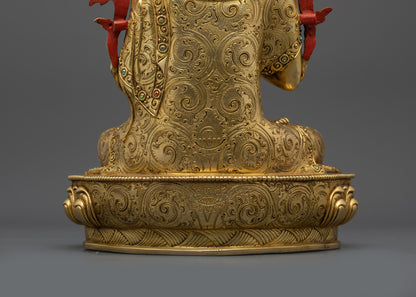 Back view of Khedrup Je statue displaying intricate carvings, gilded details, and fine finish
