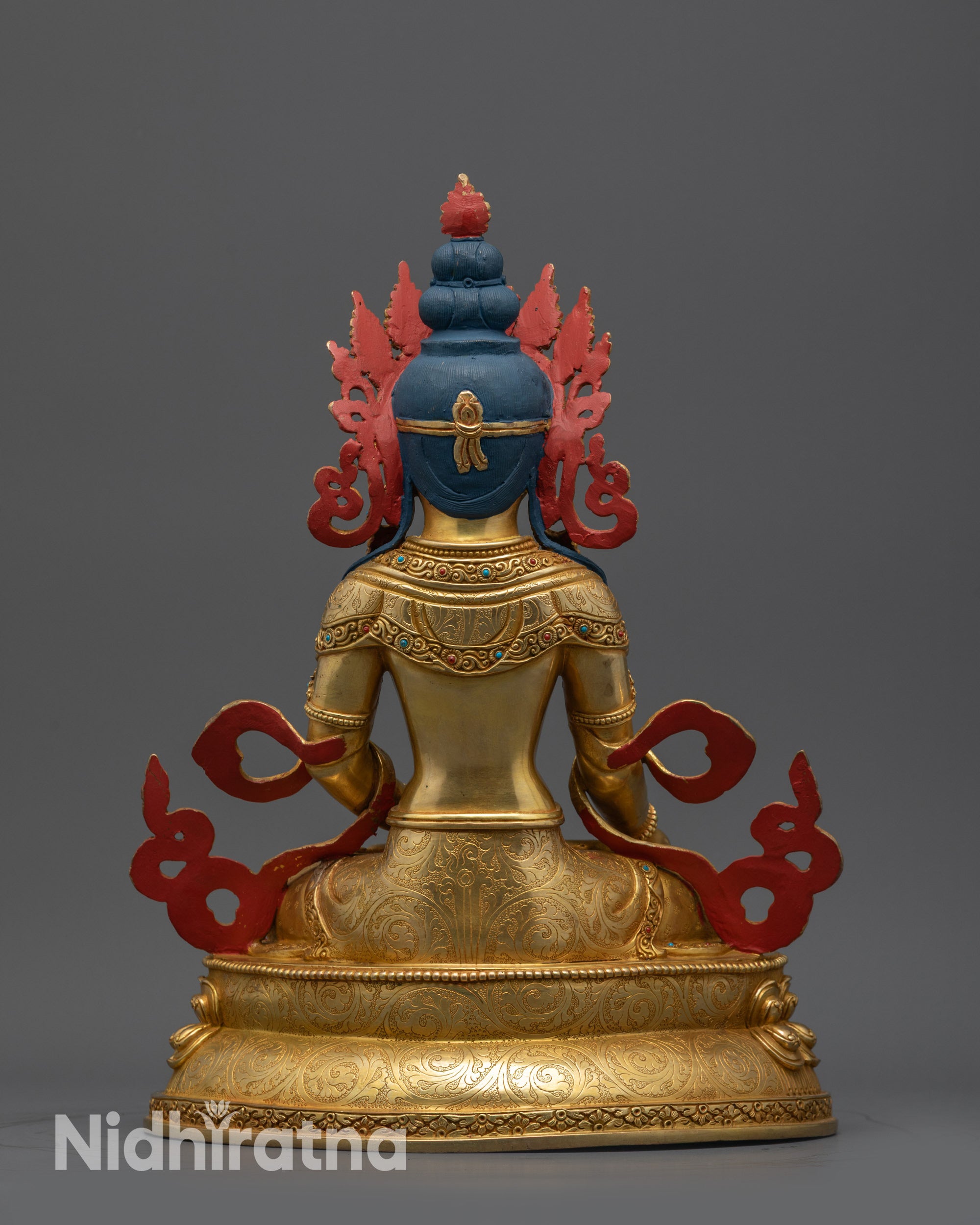 Back view of Ksitigarbha statue highlighting detailed patterns and craftsmanship of Nepalese artisans