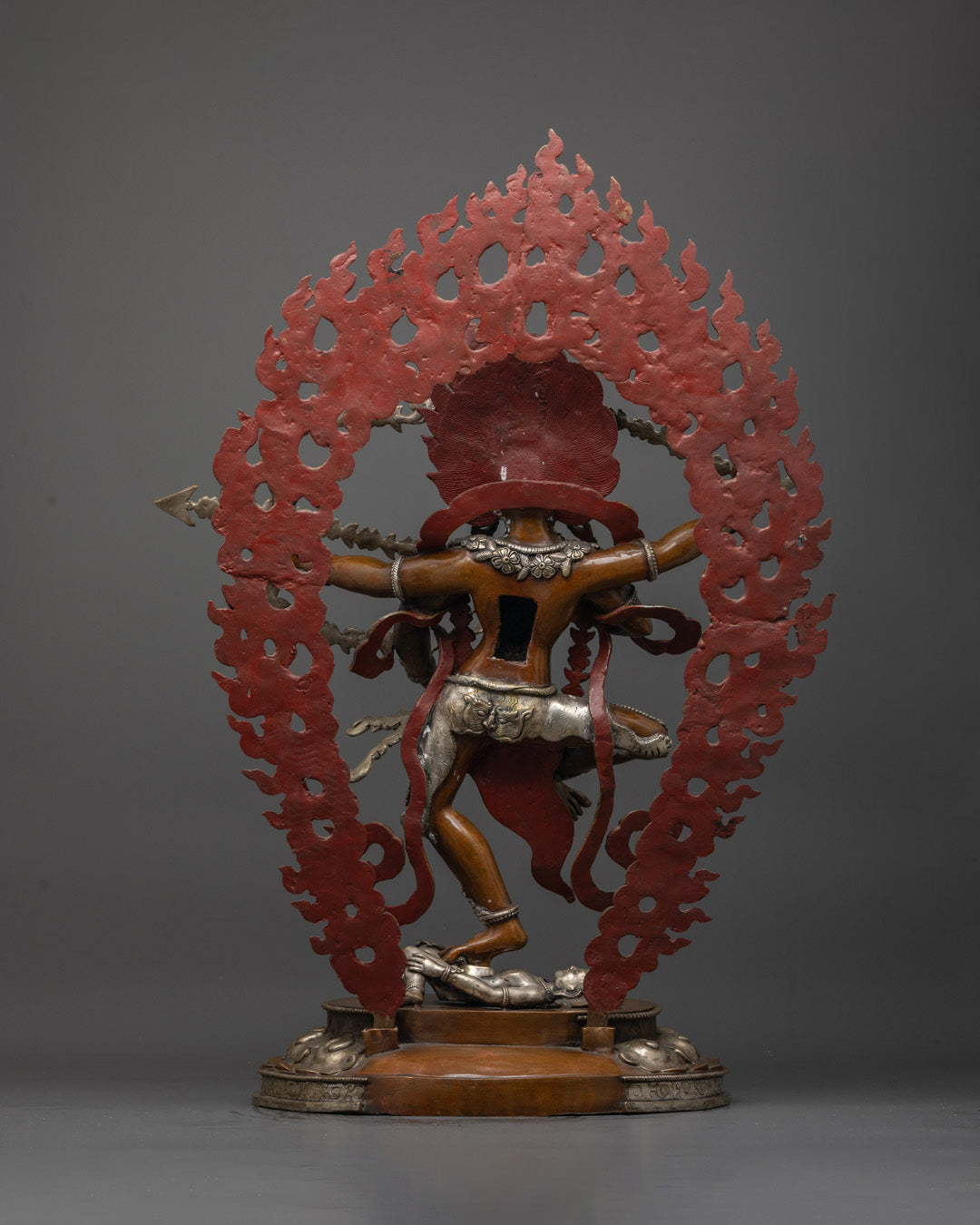 Back view of Kurukulla sculpture highlighting silver plating and masterful craftsmanship