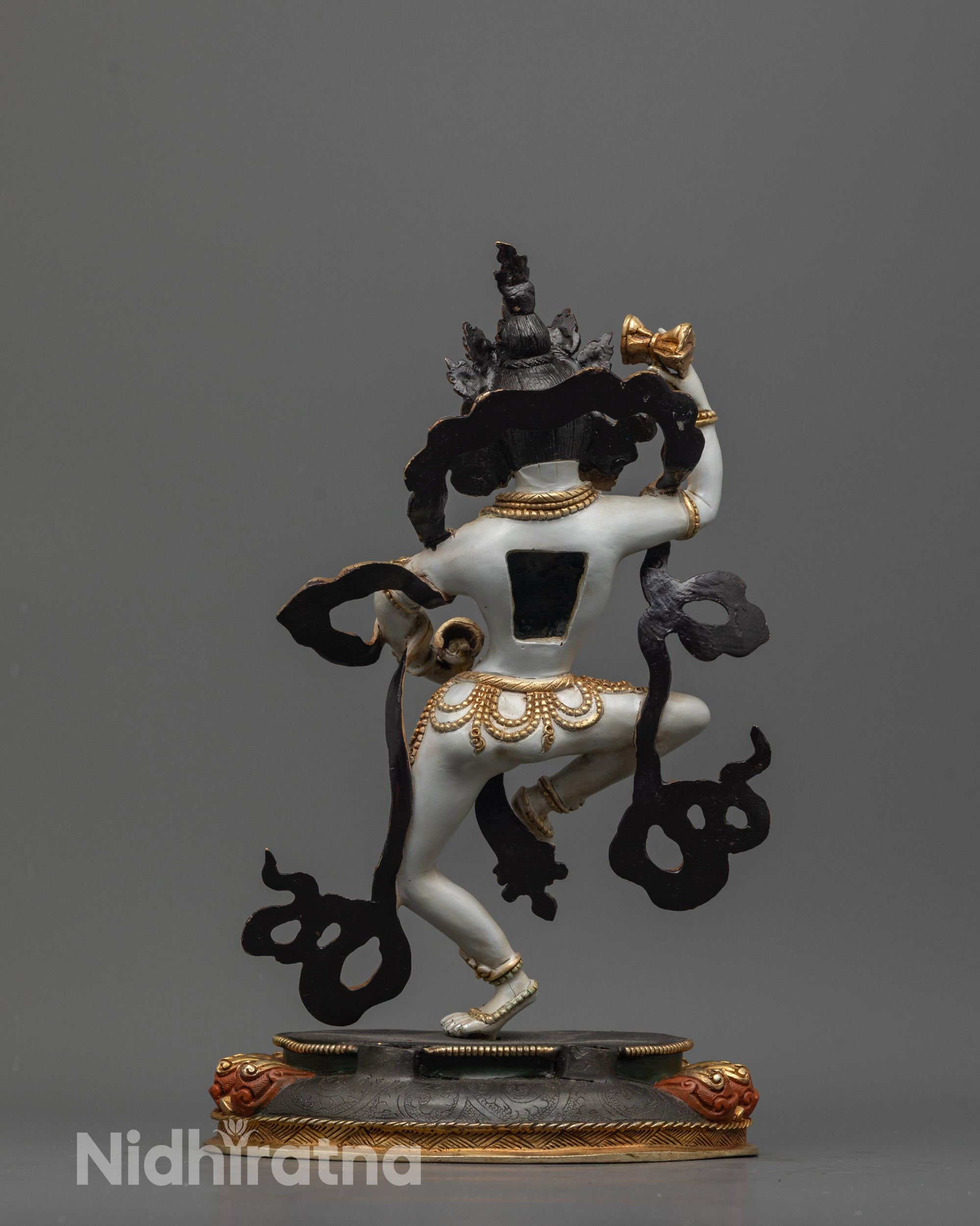 Back view of Machig Labdron Idol highlighting gold-plated halo and detailed jewelry