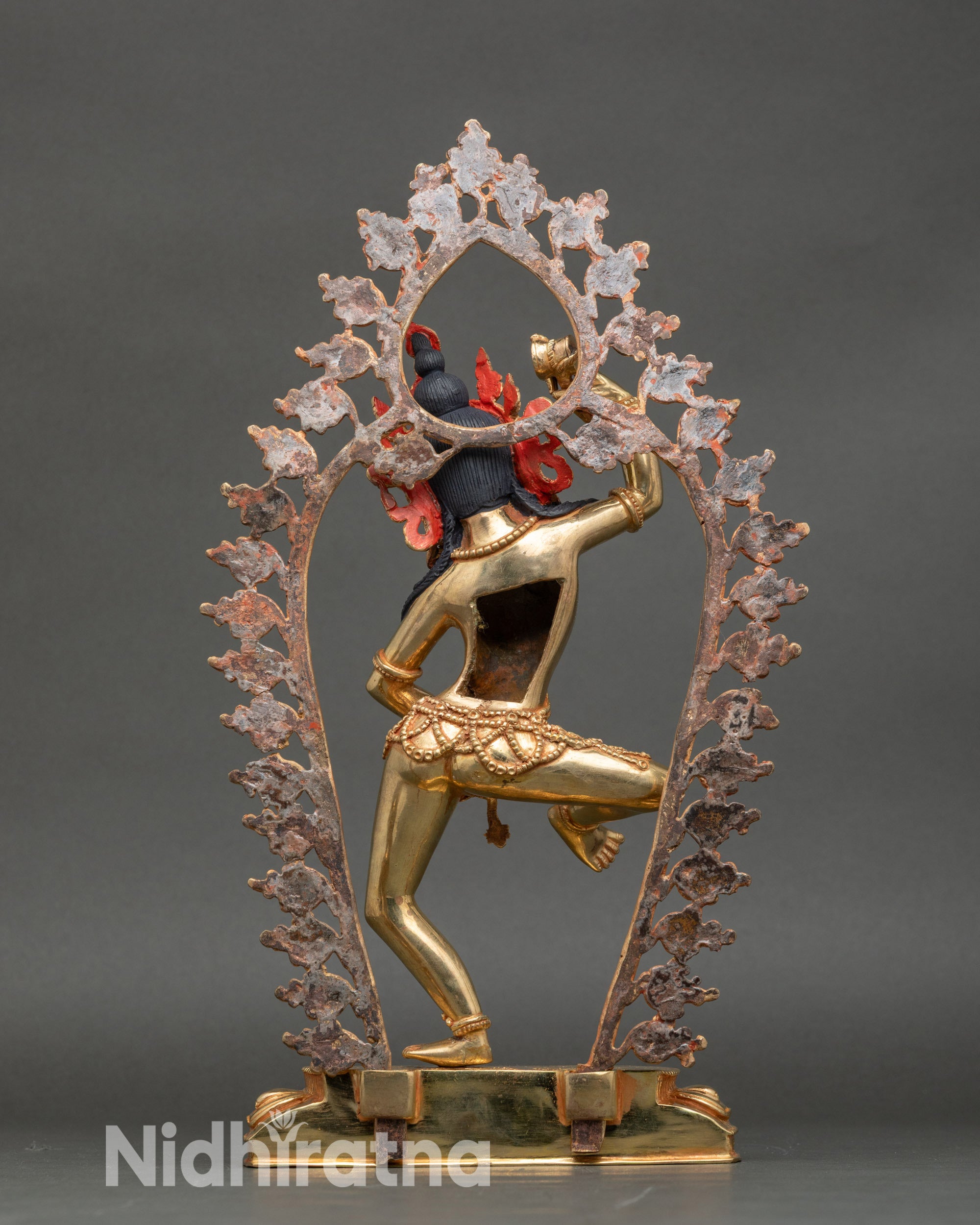 Back view of Machig Labdron Statue, detailed halo and lotus base craftsmanship