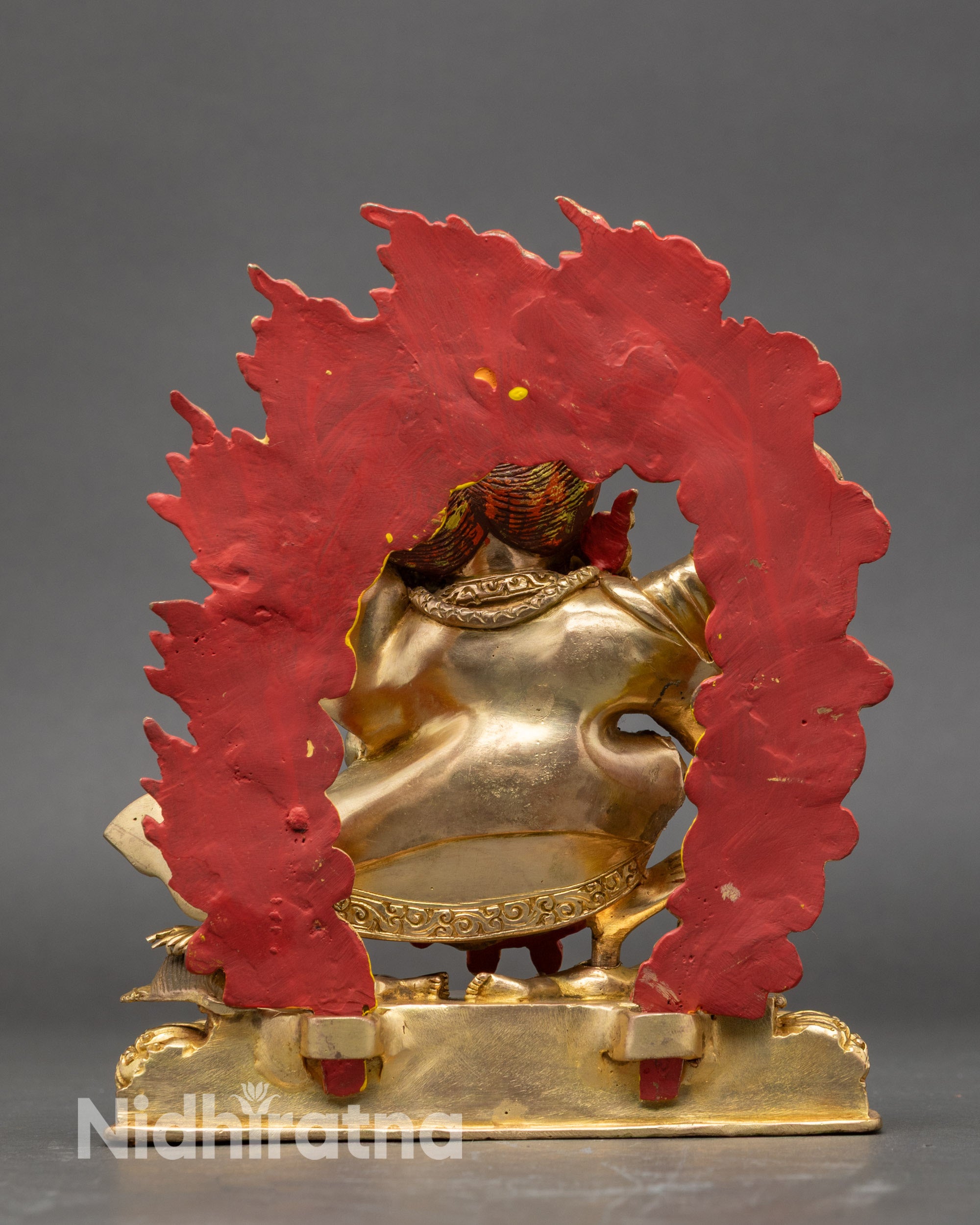 Back view of Mahakala Bernagchen statue with blazing halo and intricate Newari craftsmanship