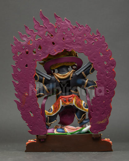 Back view of Mahakala Statue radiant wisdom flame encircled protector deity Nepal