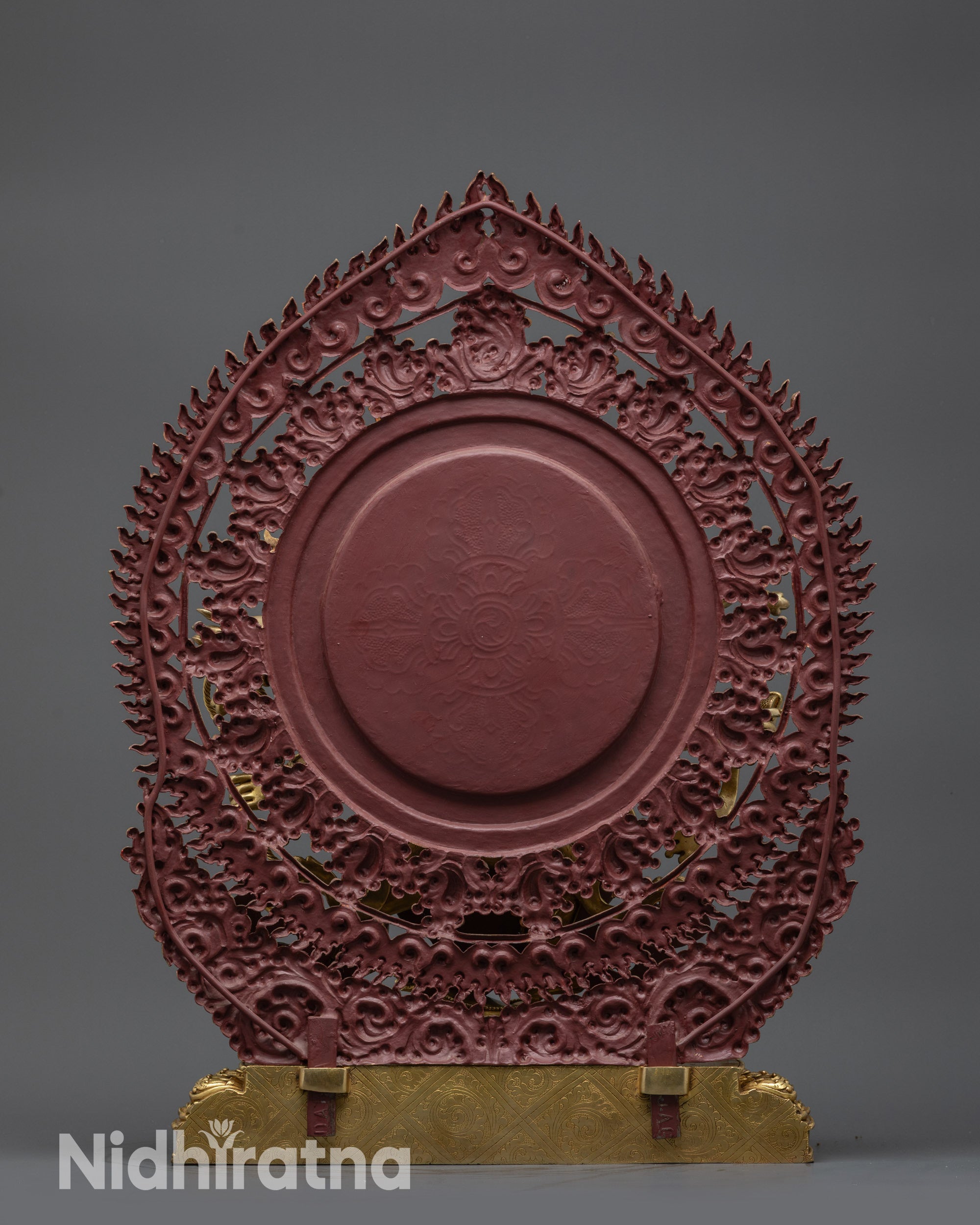 Back view of Mahakala statue with skull and serpent garland and blazing halo