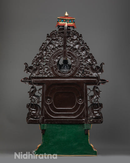 Back view of Maitreya Buddha Statue with halo, parasol, and intricately carved garments