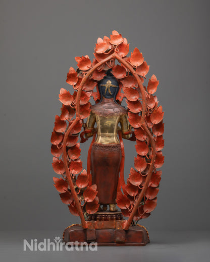Back view of Maitreya Buddha statue with detailed halo and semi-precious stone inlays