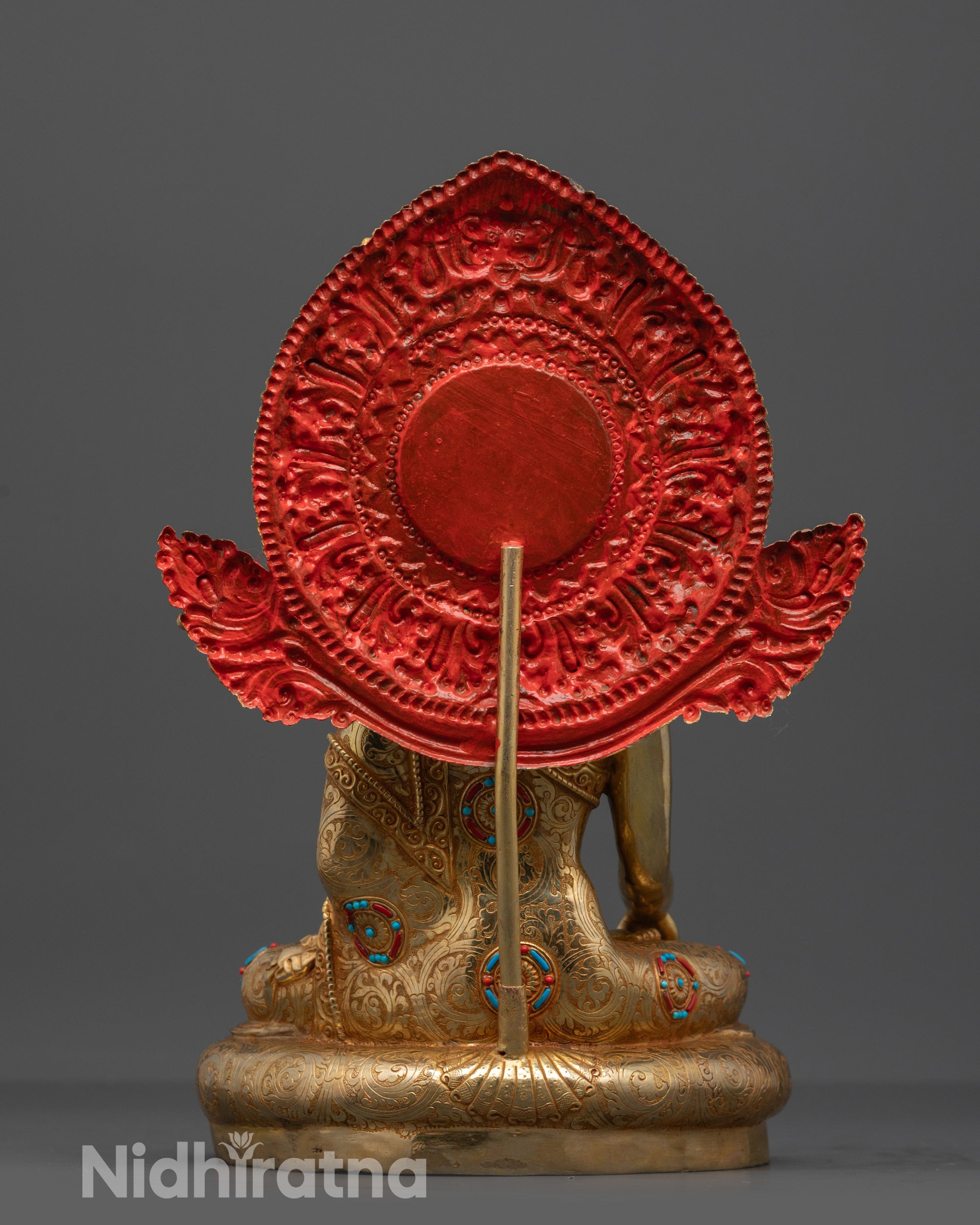 Back view of Majestic Buddha Shakyamuni Statue highlighting halo and semi-precious stones