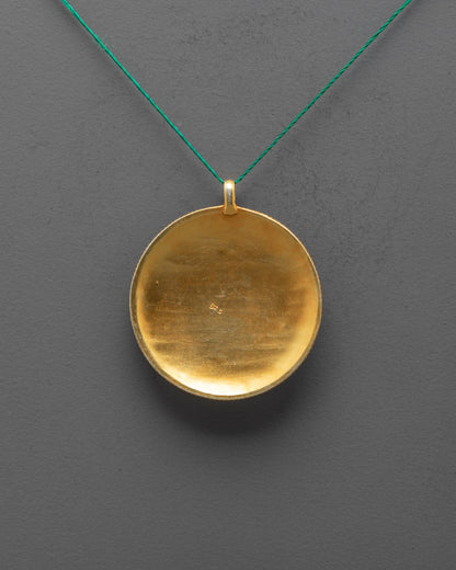 Back view of Mandala Locket pendant with detailed craftsmanship by Nepalese artisans