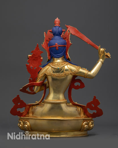 Back view of Manjushri Bodhisattva statue with detailed robe and lotus seat carving