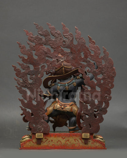 Back view of Manjushri statue showing detailed carvings and matt black body