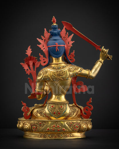 Back view of Masterpiece Manjushri Sculpture showing jewelry and robes