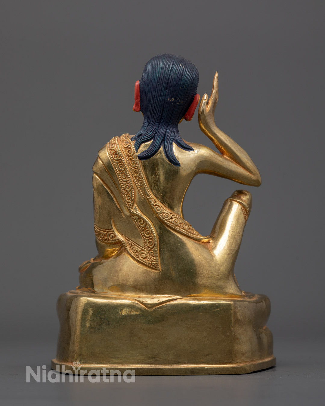 Back view of Milarepa Statue highlighting fine carvings and Nepalese artisan craftsmanship
