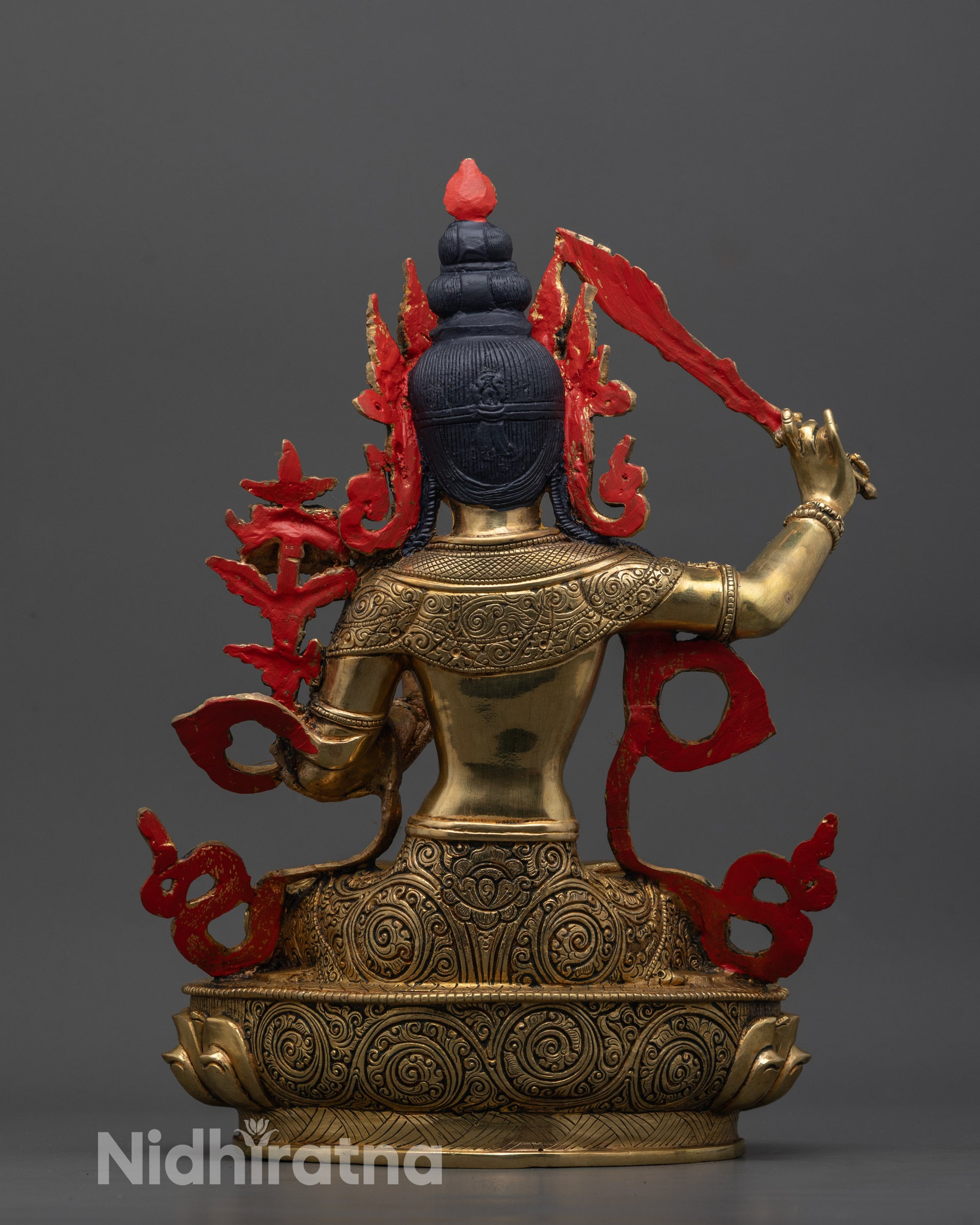 Back view of Monju Bosatsu sculpture highlighting traditional lost wax craftsmanship