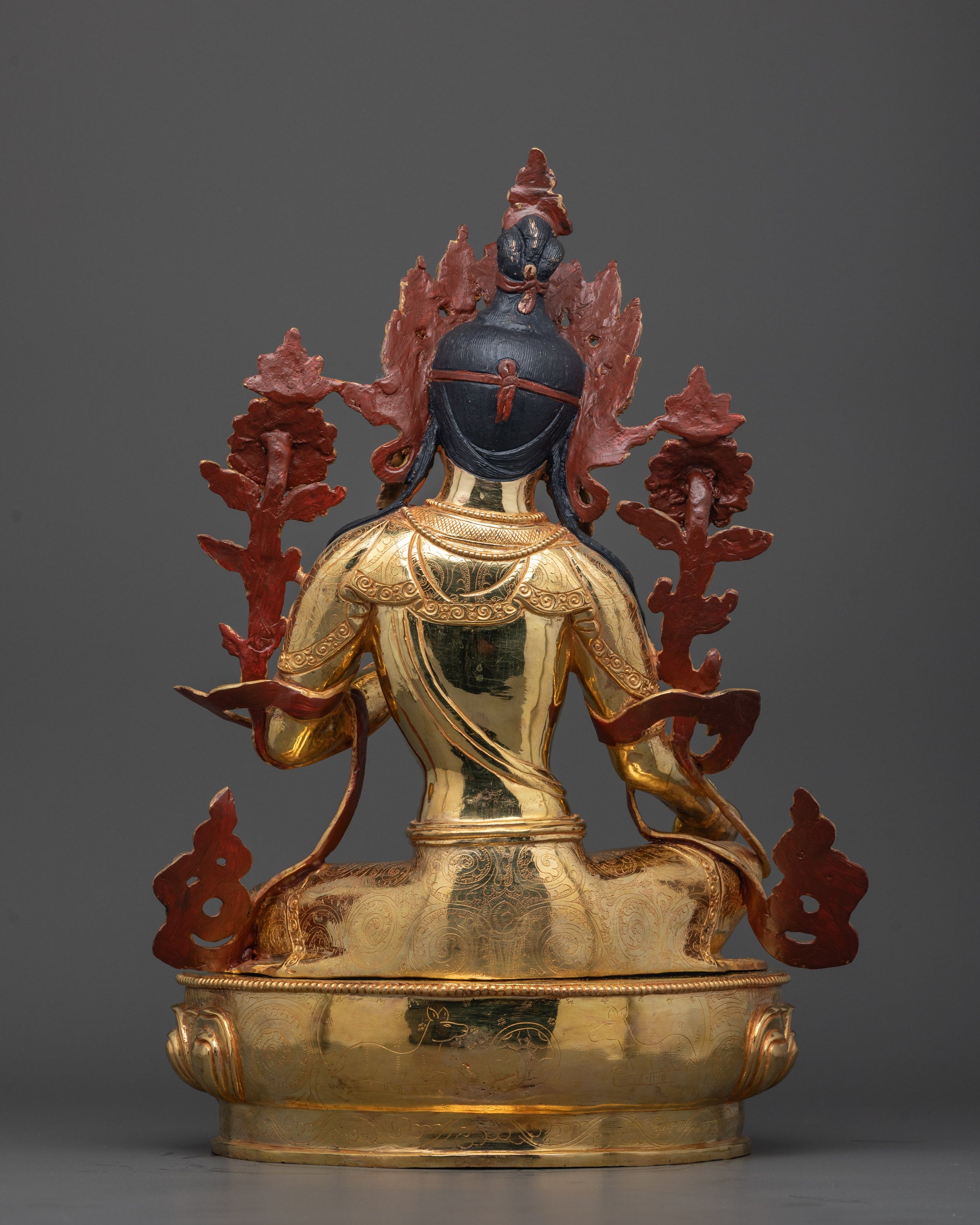 Back view of Mother Tara Sculpture highlighting meticulous carvings and sturdy copper base