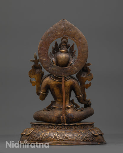 Back view of Mother Tara Statue showing intricate carvings and oxidized copper finish