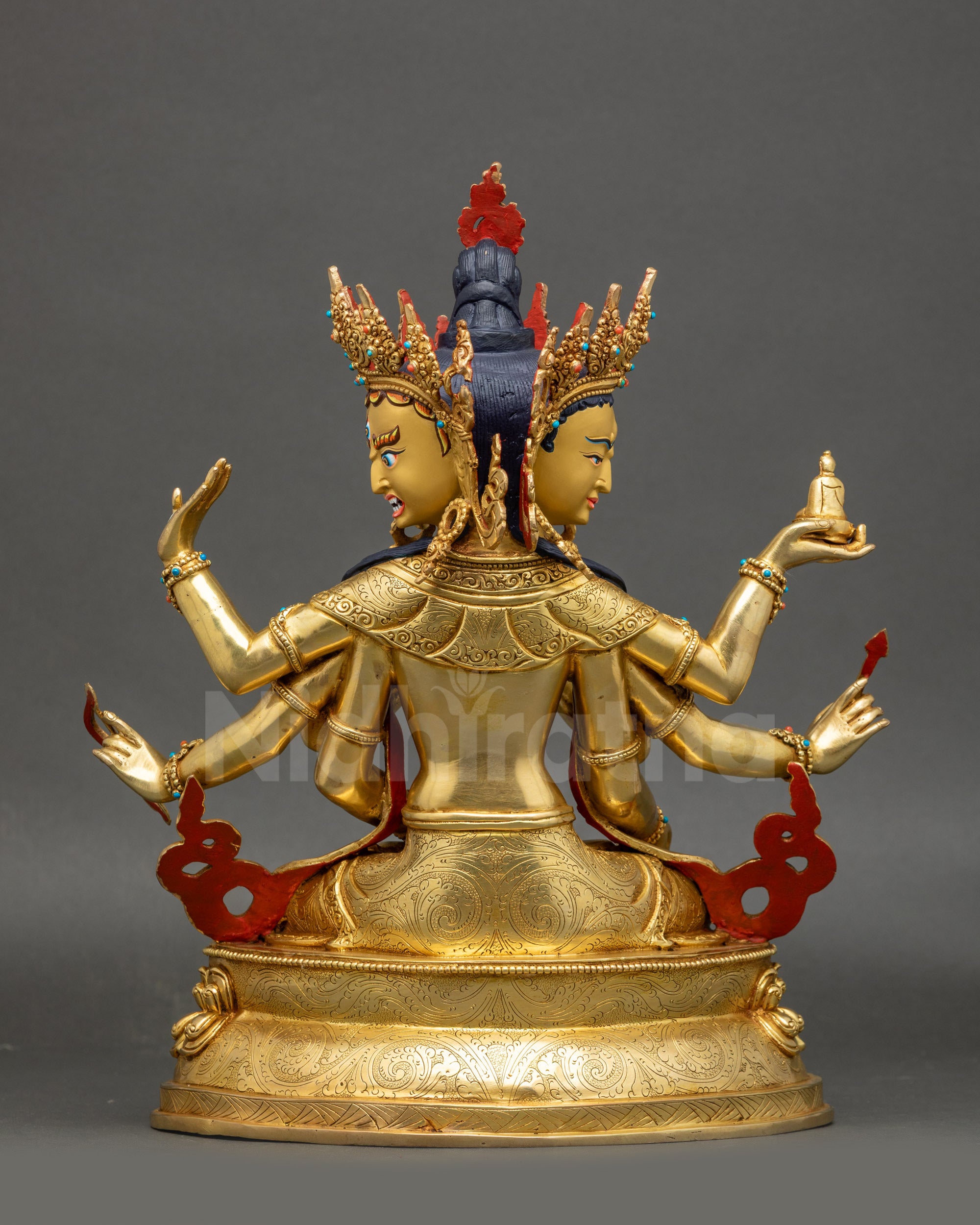 Back view of Namgyalma sculpture featuring dual deer and dharmachakra on lotus throne base