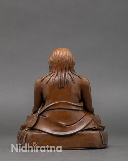 Back view of Nepalese Dilgo Khyentse Rinpoche statue highlighting craftsmanship details