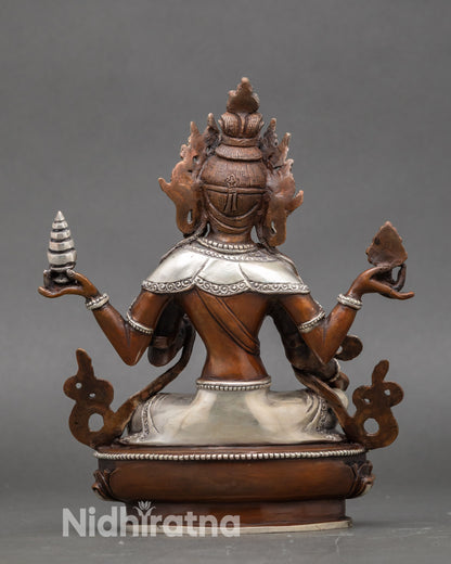 Back view of Nepalese Laxmi Statue, detailed lotus seat and sacred silver-plated finish