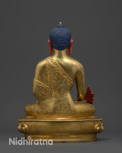 Back view of Nepalese Medicine Buddha Statue with dharma wheel and deer details