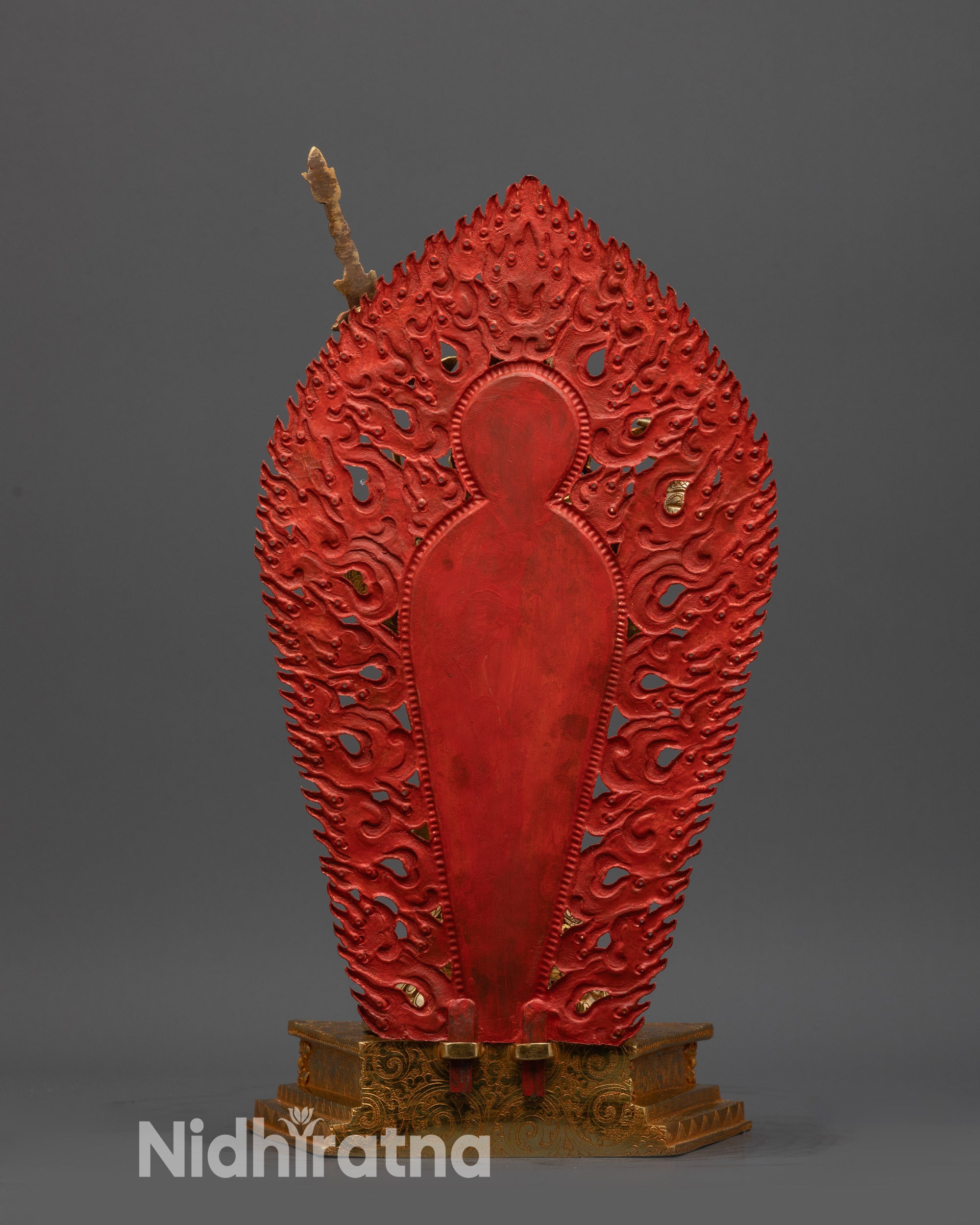 Back view of Nepalese hand-carved Guru Rinpoche statue with flowing robe and halo