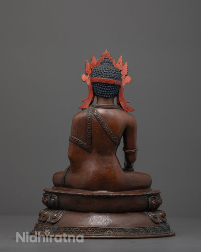 Back view of Oxidized Crowned Shakyamuni Buddha seated on lotus base with semi-precious stones