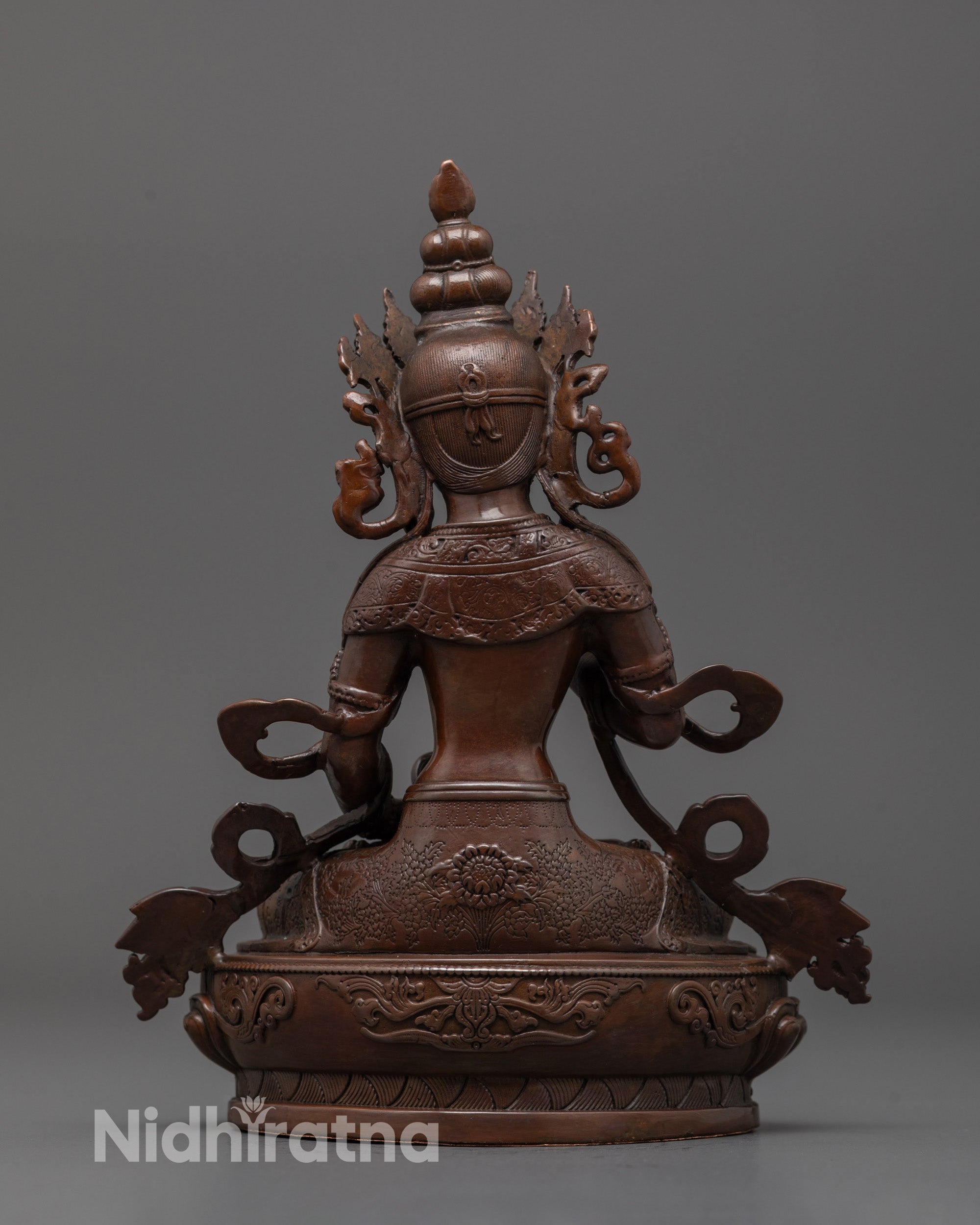Back view of electroplated Vajrasattva statue with refined oxidized copper surface detailing