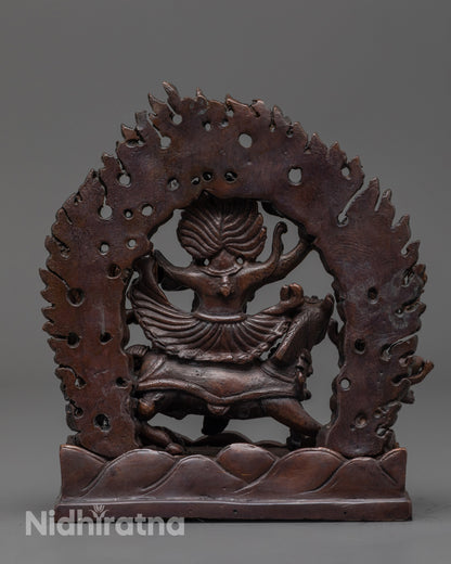 Back view of Palden Lhamo statue showing flowing robes and detailed oxidized copper finish