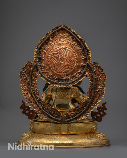 Back view of Premium Dzambhala statue showing carved halo, robe patterns, and gemstone accents