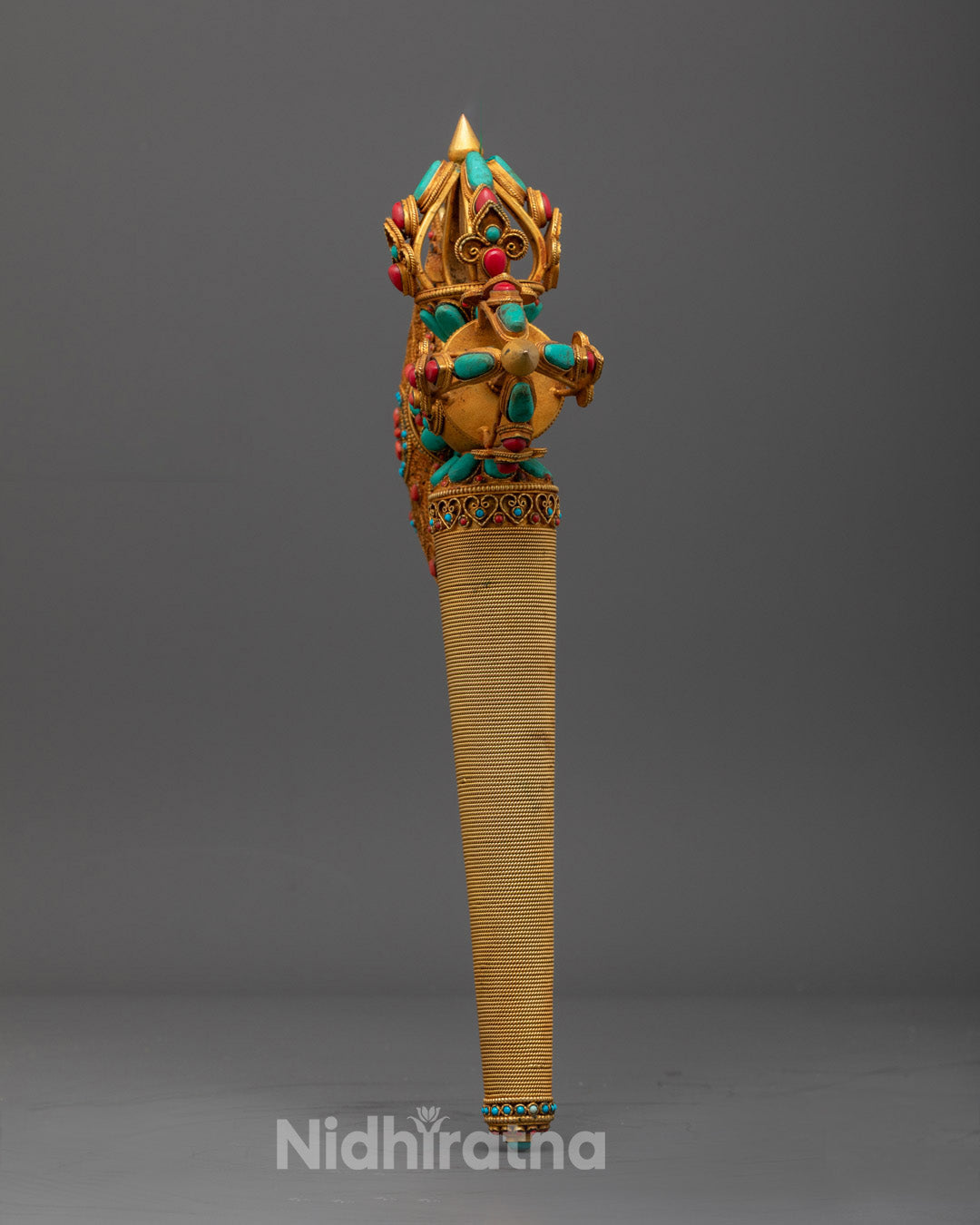 Back view of Sacred Kartika Axe with intricate gold plating and sacred symbolism