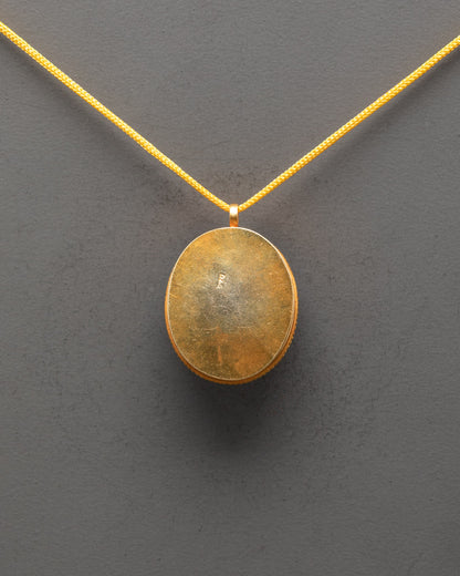 Back view of Sacred Tibetan Locket Pendant showing detailed artisan work and smooth finish