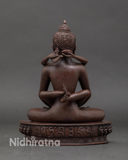 Back view of Samanthabhadra statue highlighting lotus throne and engraved sacred motifs