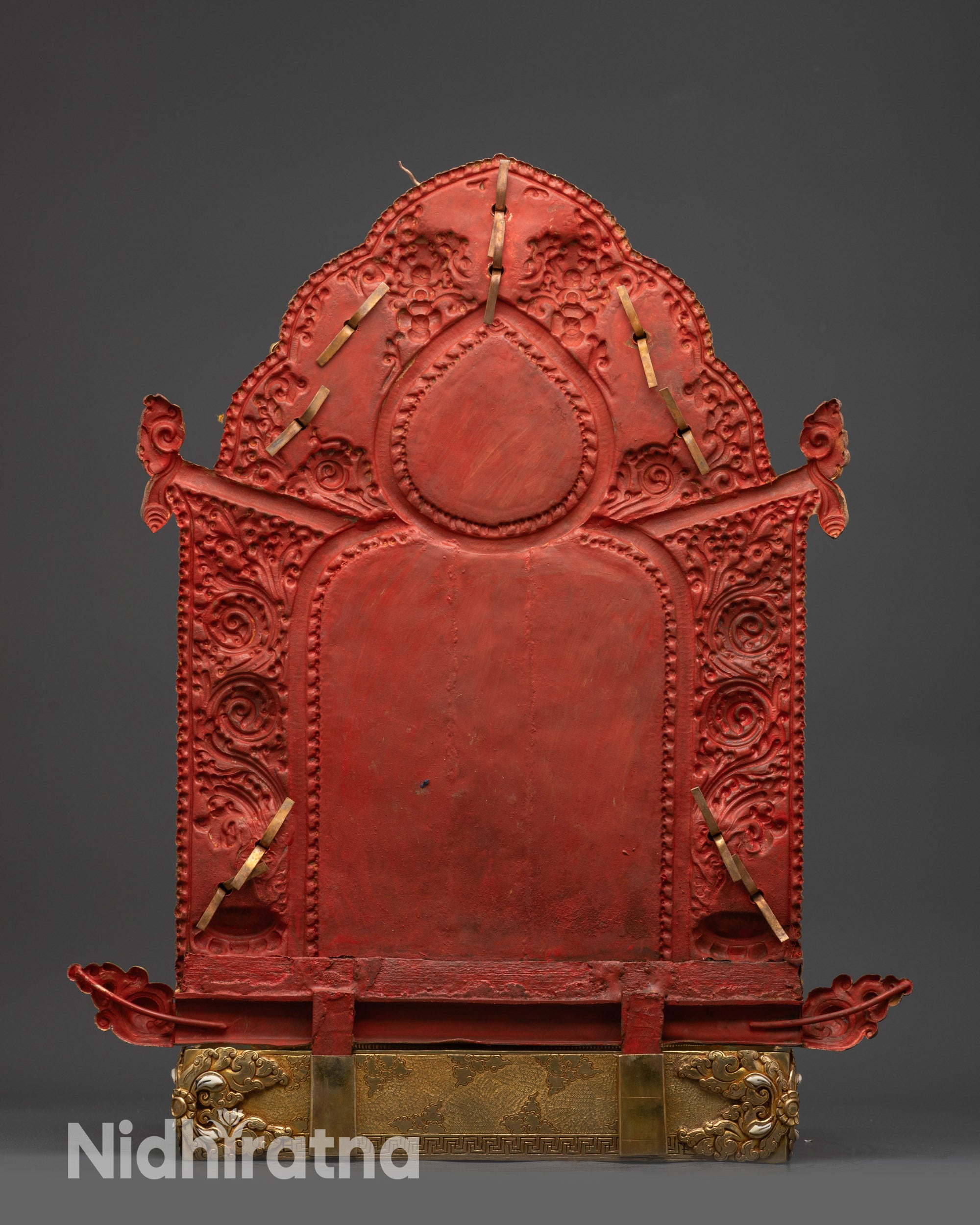 Back view of Serene Chenrezig statue revealing gilded robes, carved patterns, and halo details