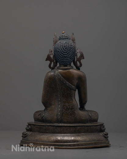 Back view of Serene Shakyamuni Buddha statue handcrafted in Patan, Nepal,
