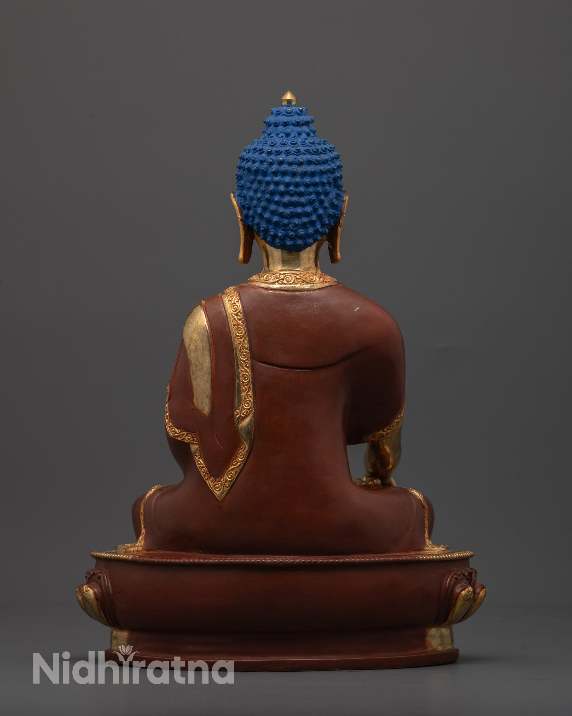 Back view of Shakyamuni Buddha Statue revealing consecration chamber
