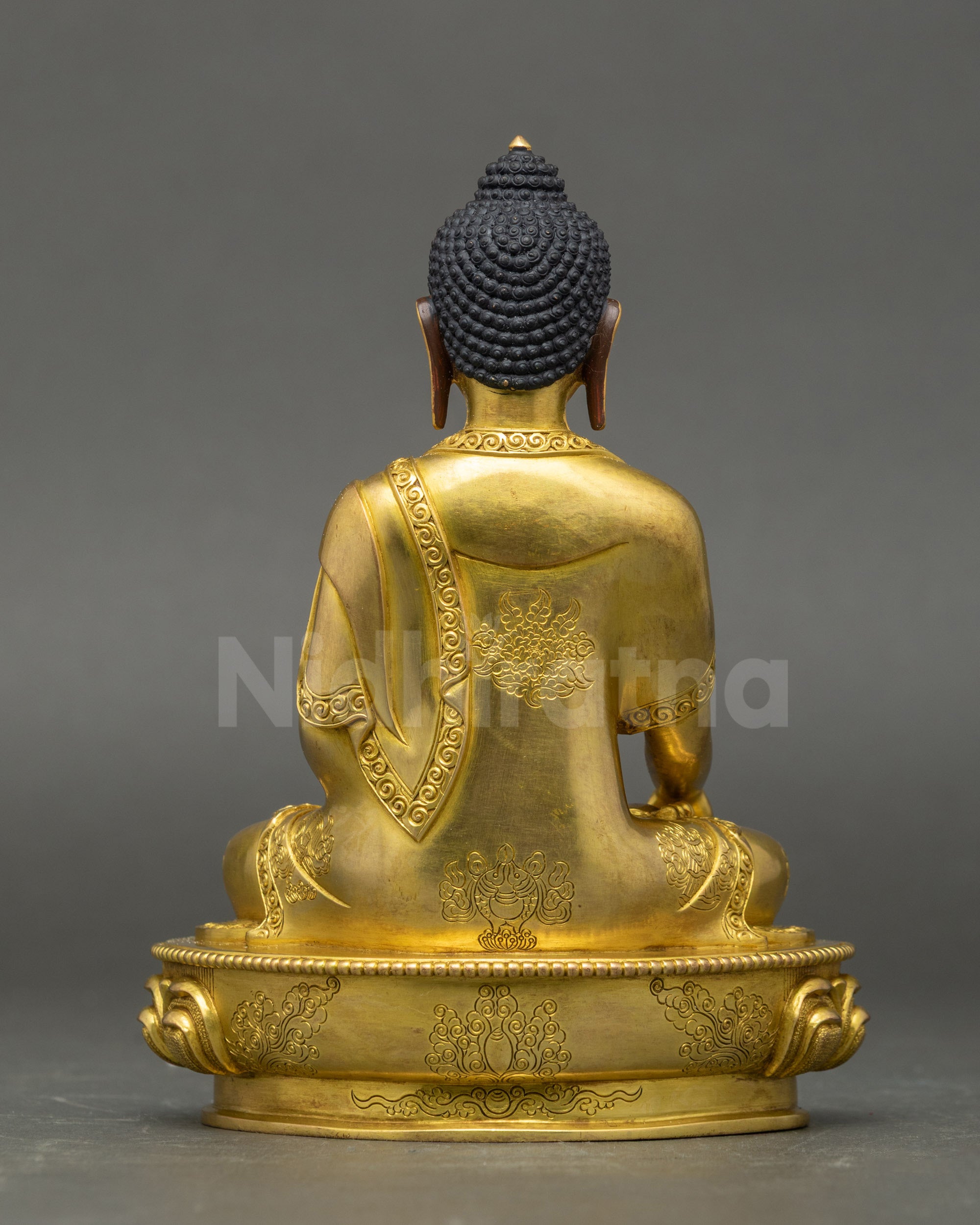 Back view of Shakyamuni Buddha Statue revealing detailed robes and craftsmanship