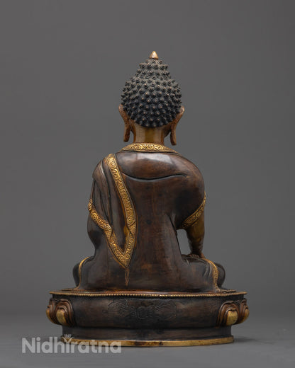 Back view of Shakyamuni Buddha Tibetan Statue highlighting robe and throne design
