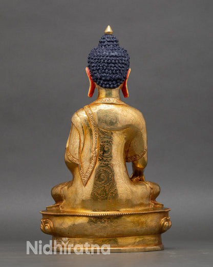 Back view of Shakyamuni Buddha meditation statue showing handcrafted copper detailing