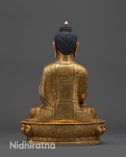 Back view of Shakyamuni Buddha statue showing detailed robe carvings