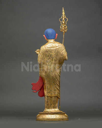 Back view of Shakyamuni Buddha with Disciples Statue showing intricate robes and gilding