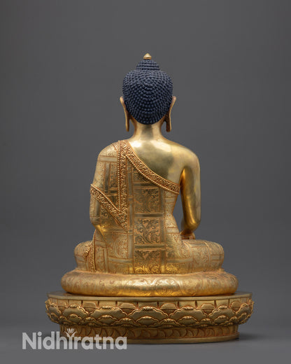 Back view of Siddhartha Gautama Buddha statue with detailed robe and lotus base
