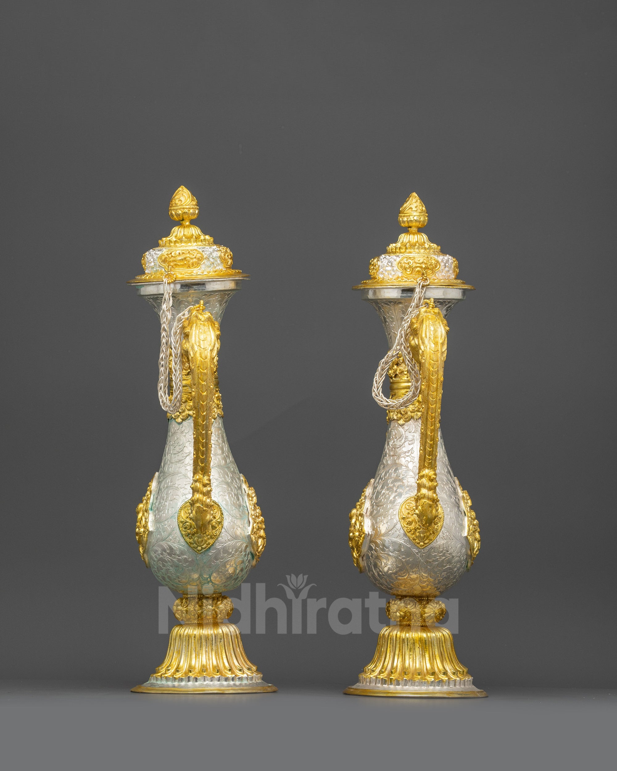 Back view of Tea potset with floral carvings and gold-plated celestial deity motifs